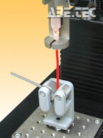 Testování drátu použitím svěrek G1001E a G1002E.
